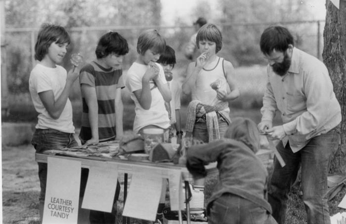 boys gathered around table